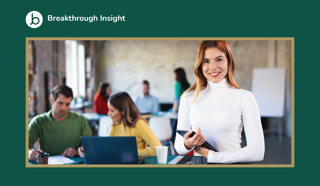 Visibility at work and career progression – confident professional standing in front of team meeting